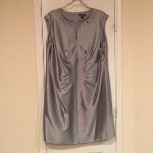 Silver sleeveless cocktail dress.